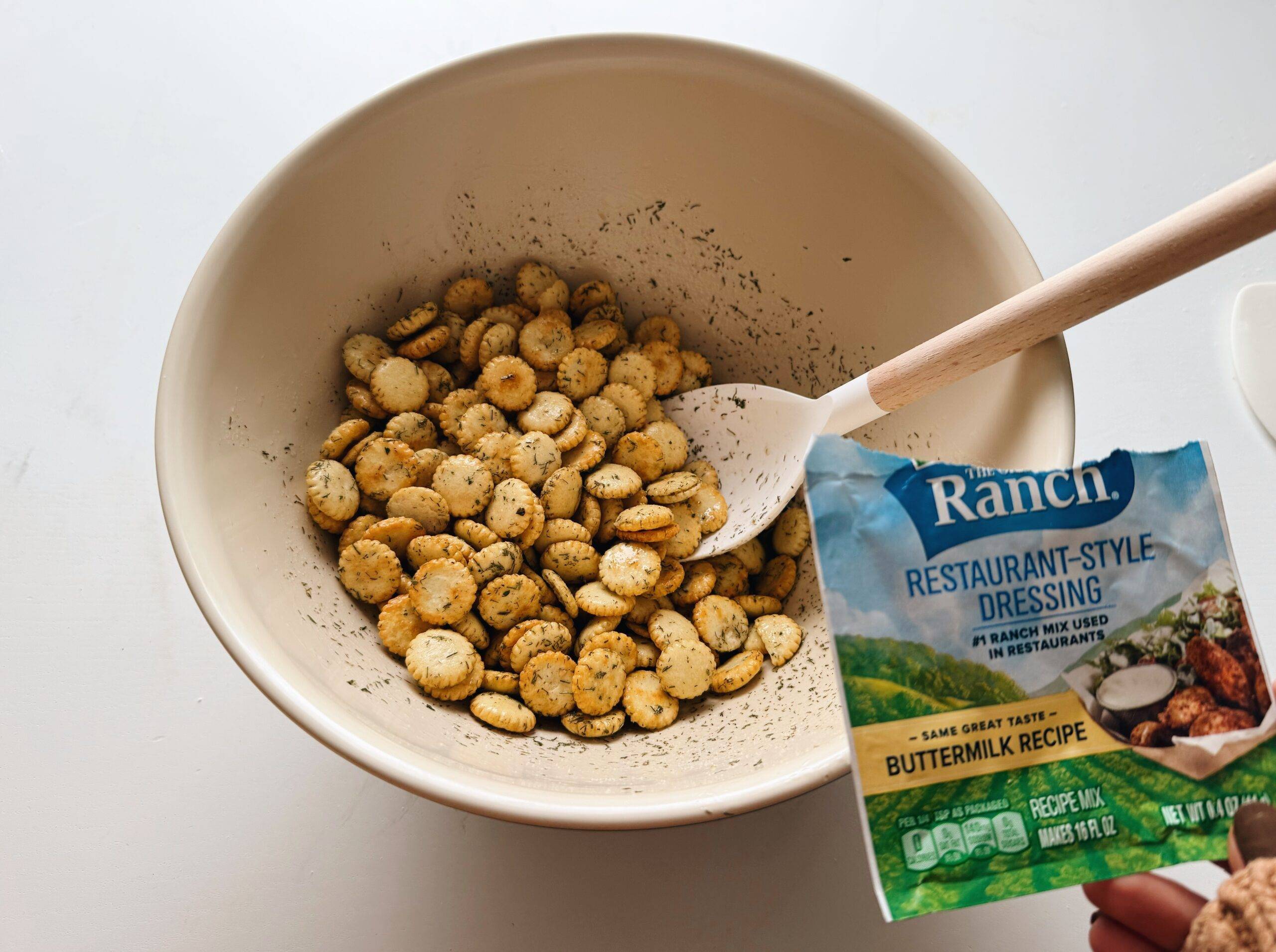 Ranch and Oyster Crackers Mixing in a Bowl