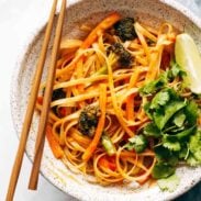 Red curry noodles in bowl.