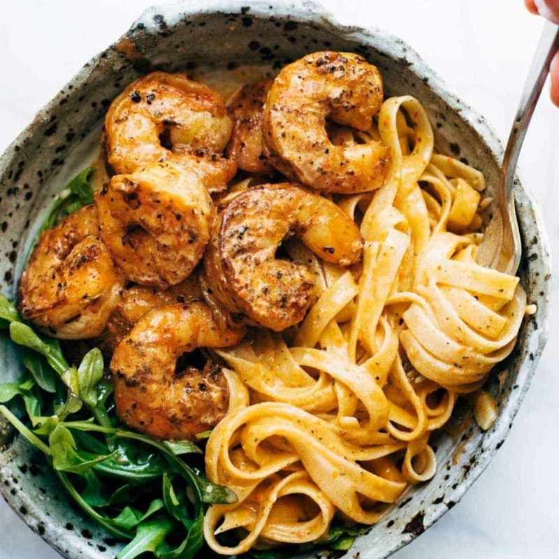 Red Pepper Fettuccine in a bowl with shrimp.