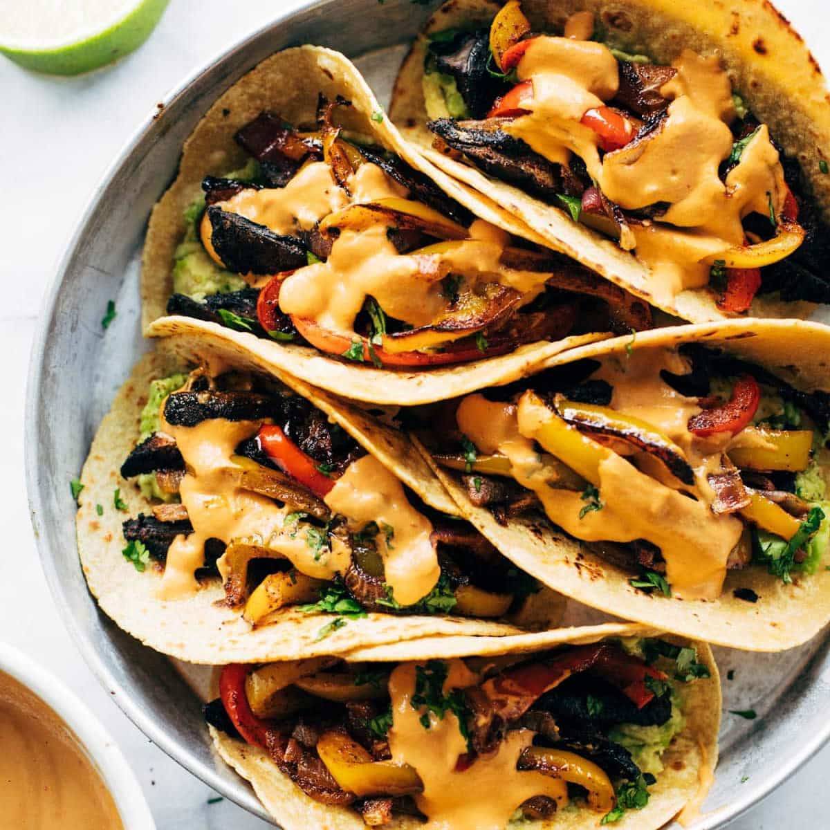 Fajitas with bell peppers, mushrooms, and cashew queso.