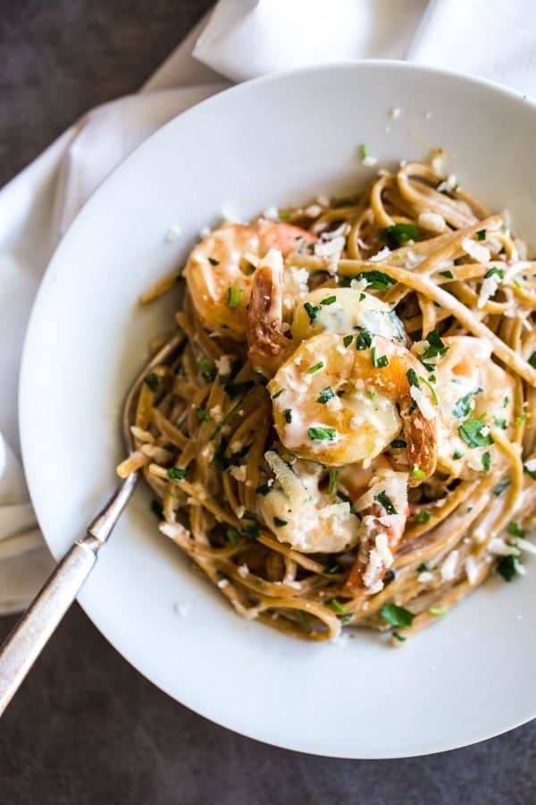 Linguine in a bowl with a fork.