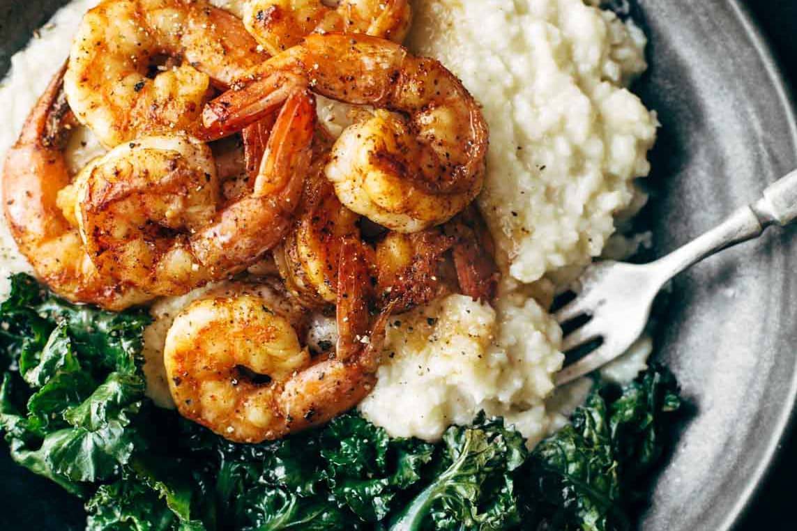 Spicy Shrimp and Cauliflower Mash with a fork.