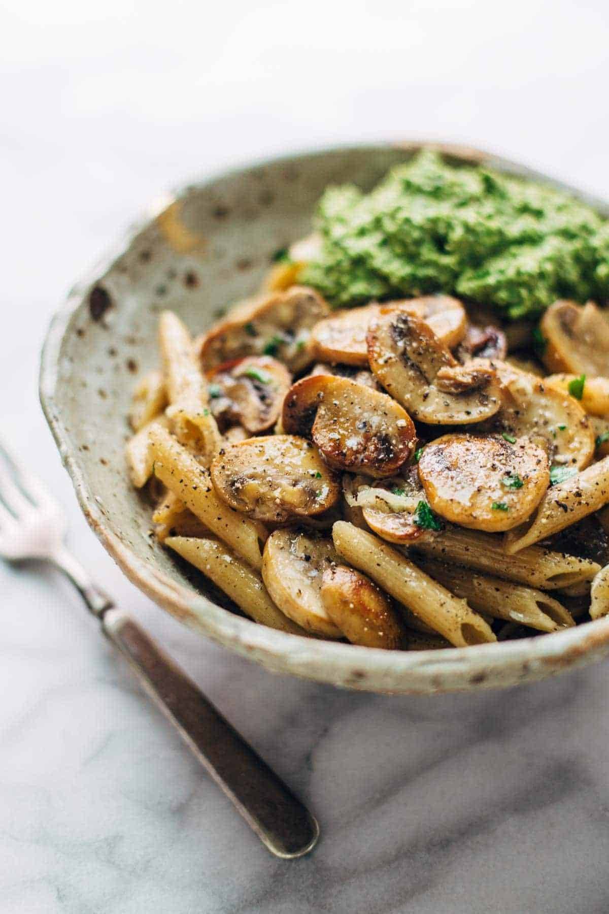 Simple Mushroom Penne with Walnut Pesto - made with easy ingredients like Parmesan cheese, whole wheat penne, mushrooms, garlic, and butter. Vegetarian. | pinchofyum.com