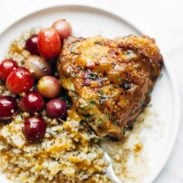 Skillet Chicken with Grapes and Caramelized Onions on a plate.