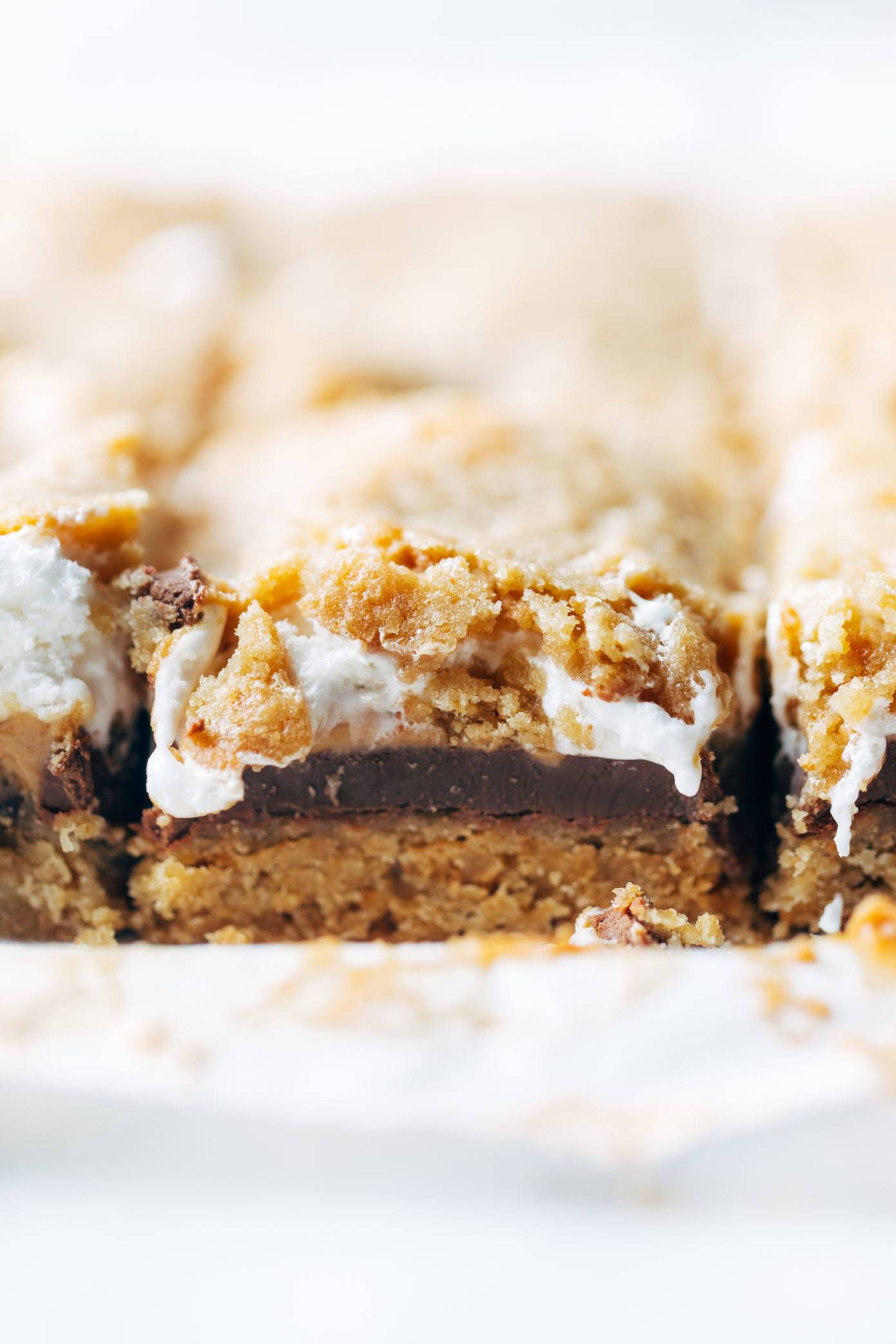 Straight on shot of s'mores bars on parchment paper