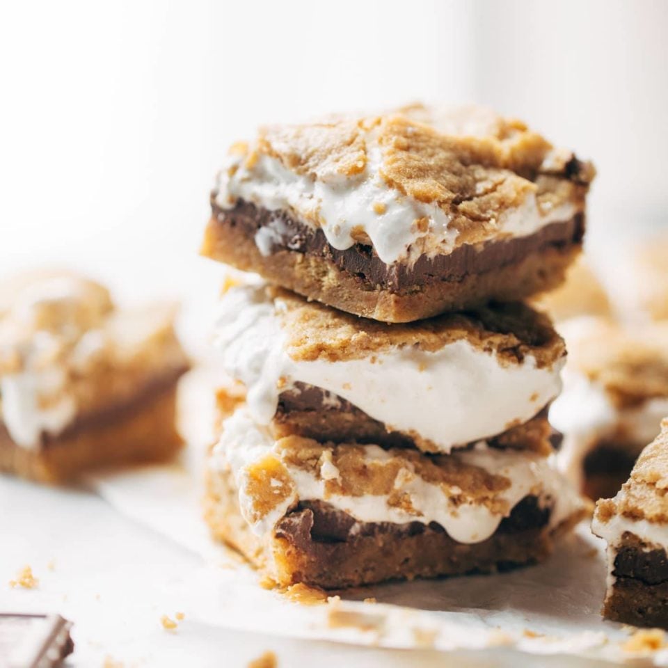 S'Mores Bars in stack with melted marshmallows.
