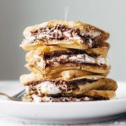 Smores Waffles in a stack with coconut sprinkle.