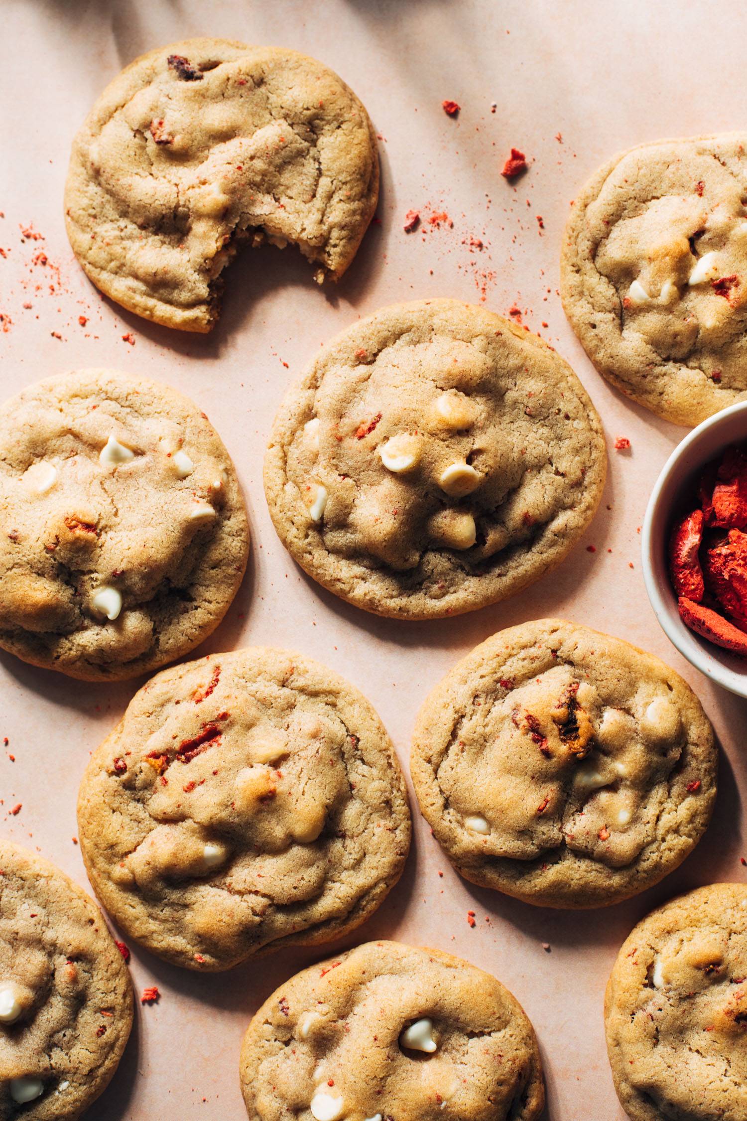 Strawberry white chocolate cookies with freeze-dried strawberries in a dish