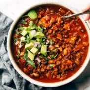 Sunday chili in a bowl with a spoon.