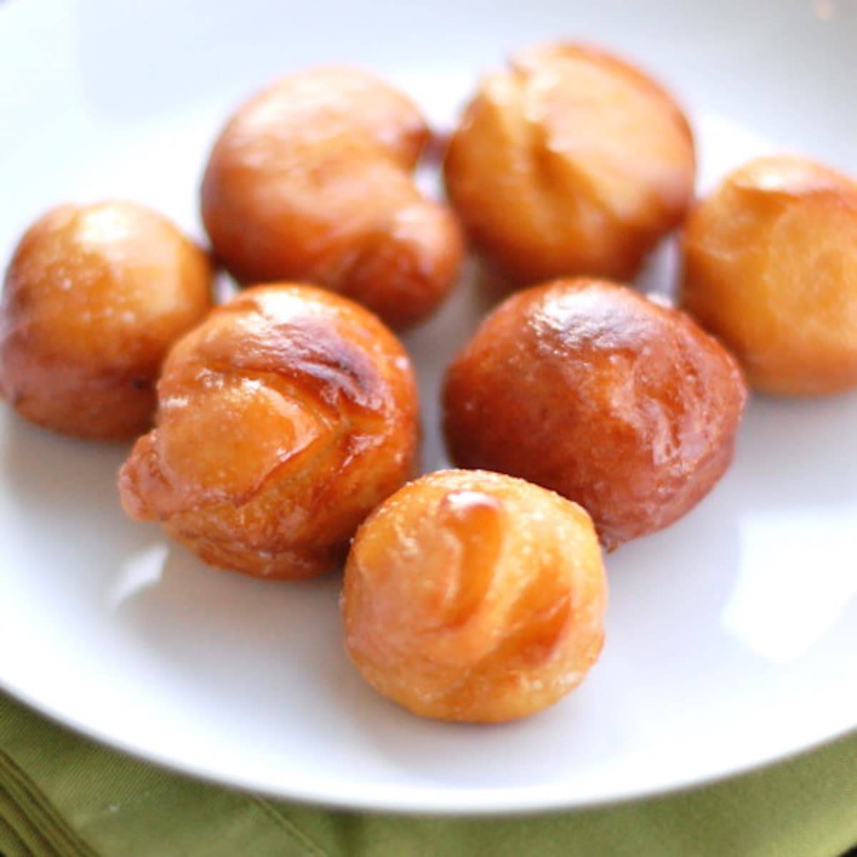 Sweet potato doughnuts on a plate.