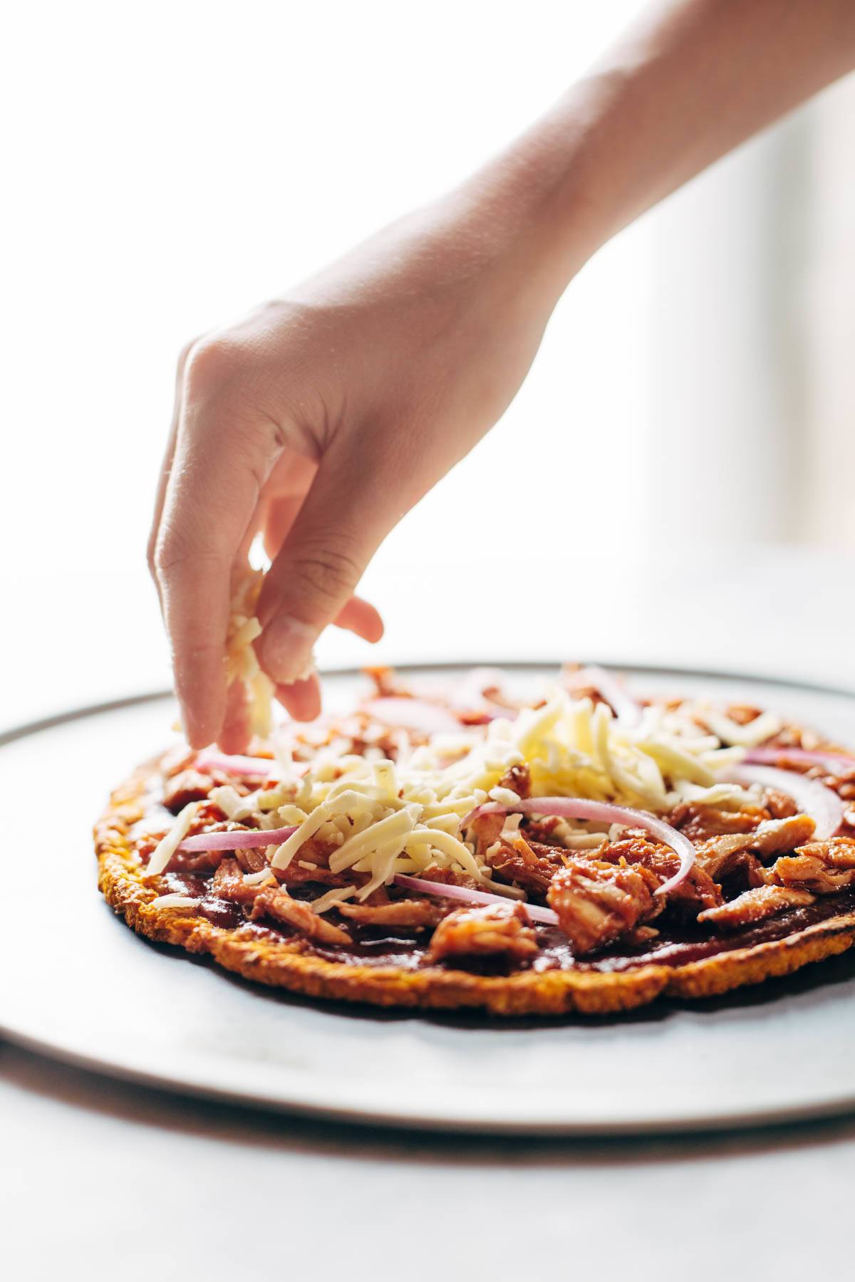BBQ Chicken Sweet Potato Pizza with cheese topping.