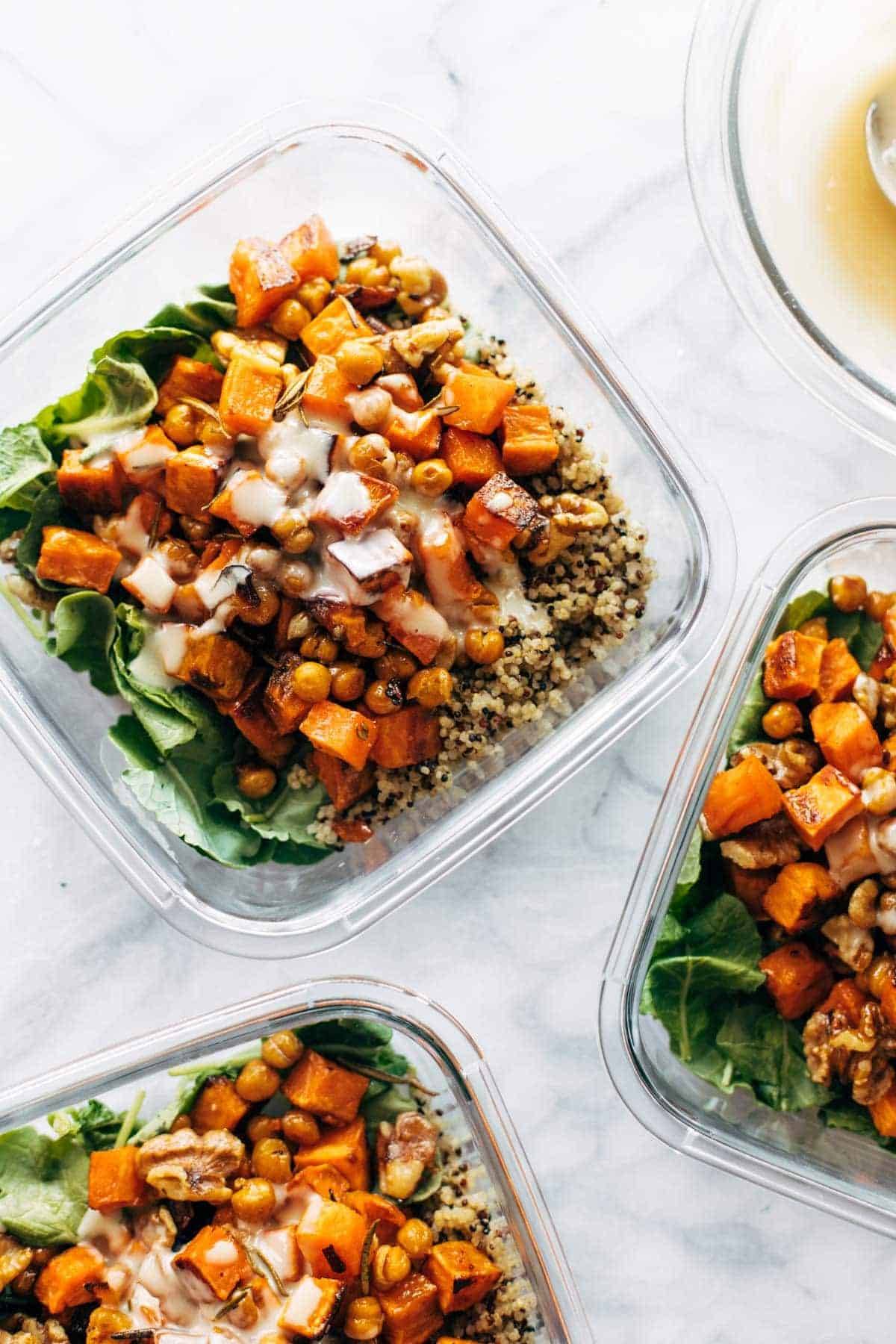 Quinoa sweet potato salad in meal prep containers.