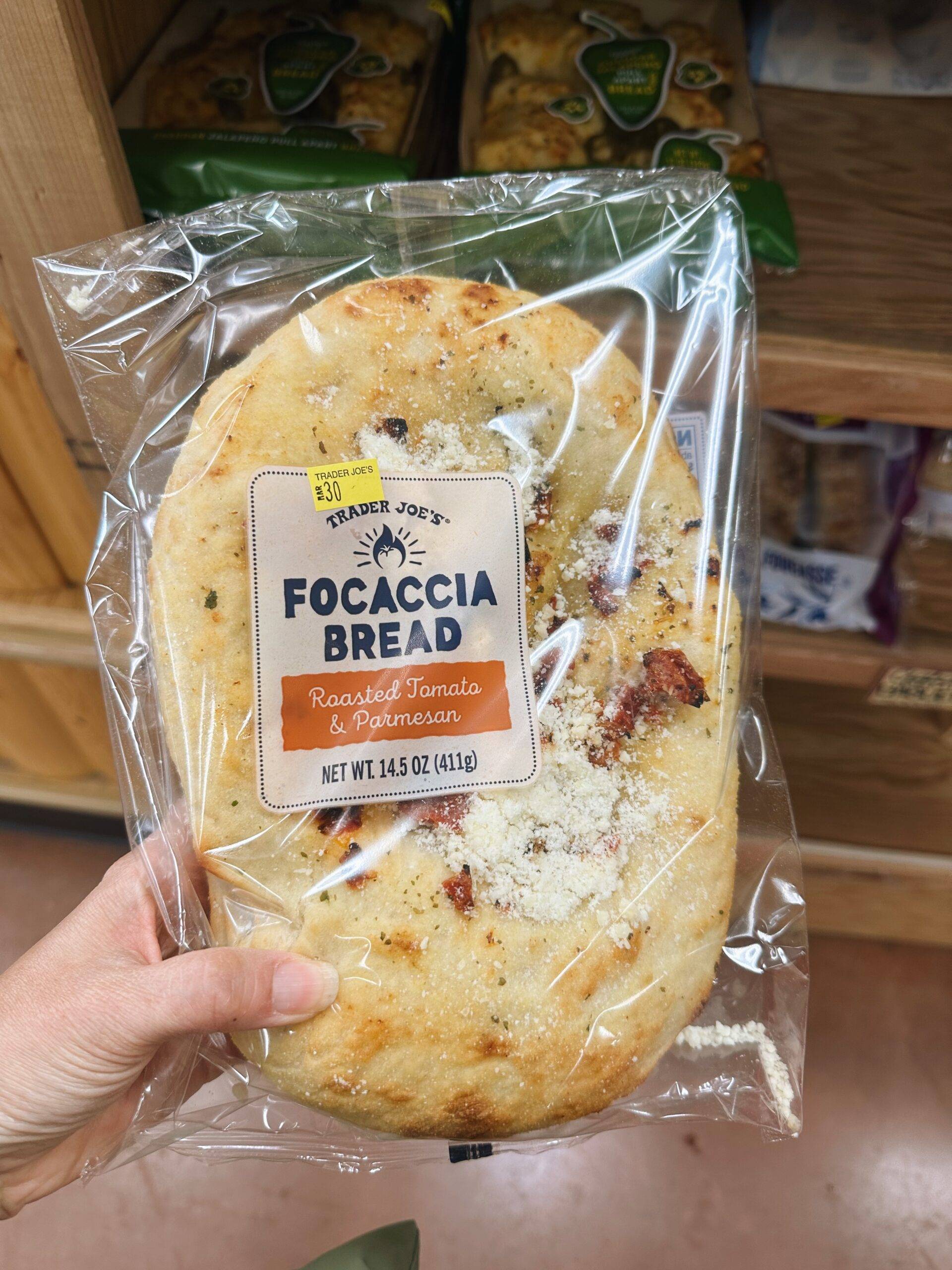 Roasted tomato focaccia bread in a bag.