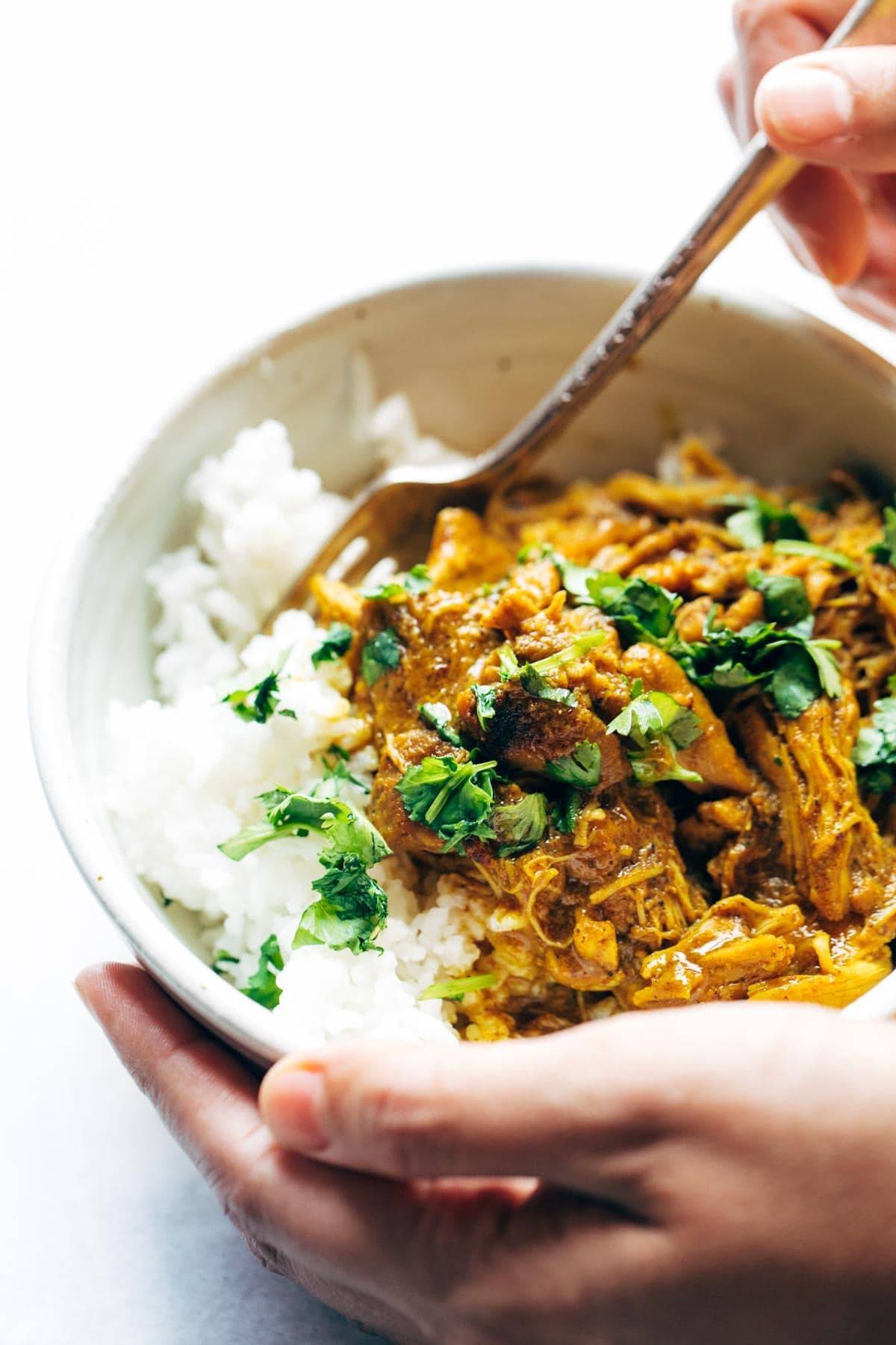 Coconut Tandoori Chicken in a bowl with rice.