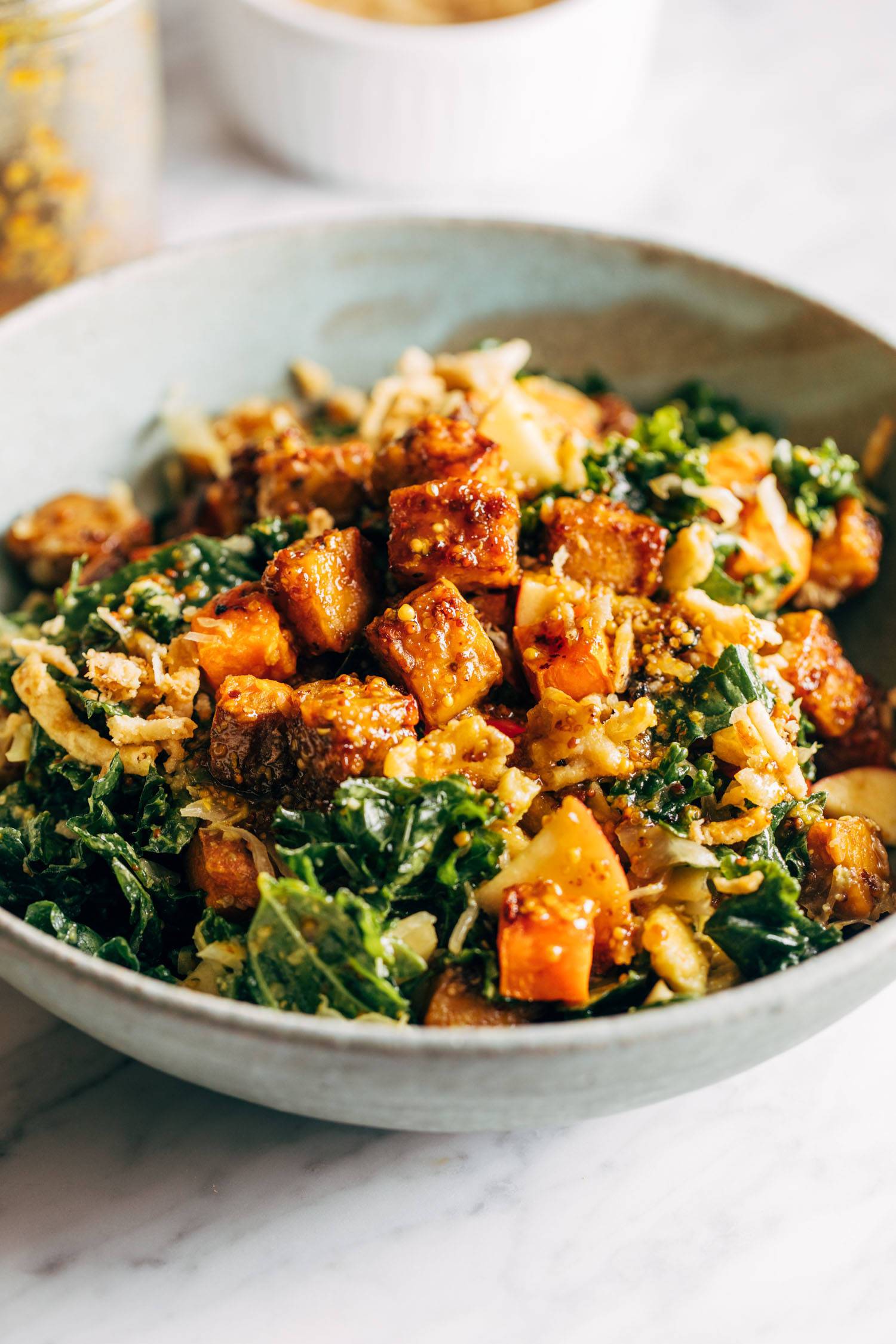 Maple mustard tempeh bowls in a grey bowl. 