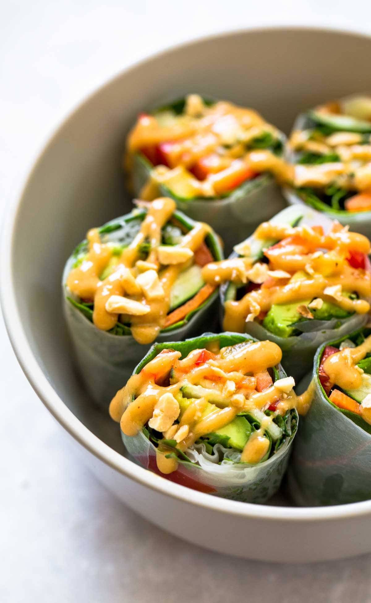 Thai Summer Rolls with Peanut Sauce in a bowl.