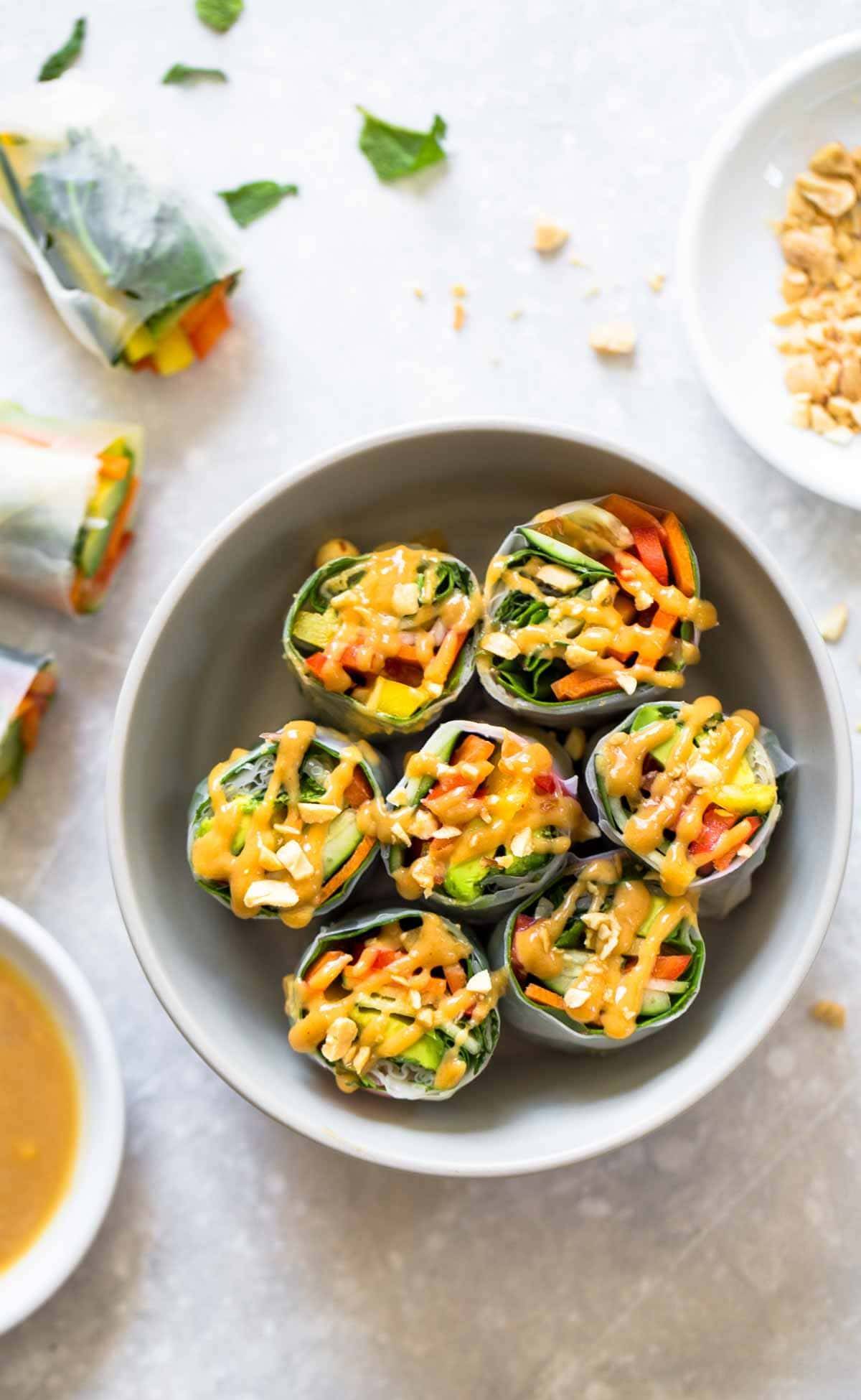 Thai Summer Rolls with Peanut Sauce in a bowl.