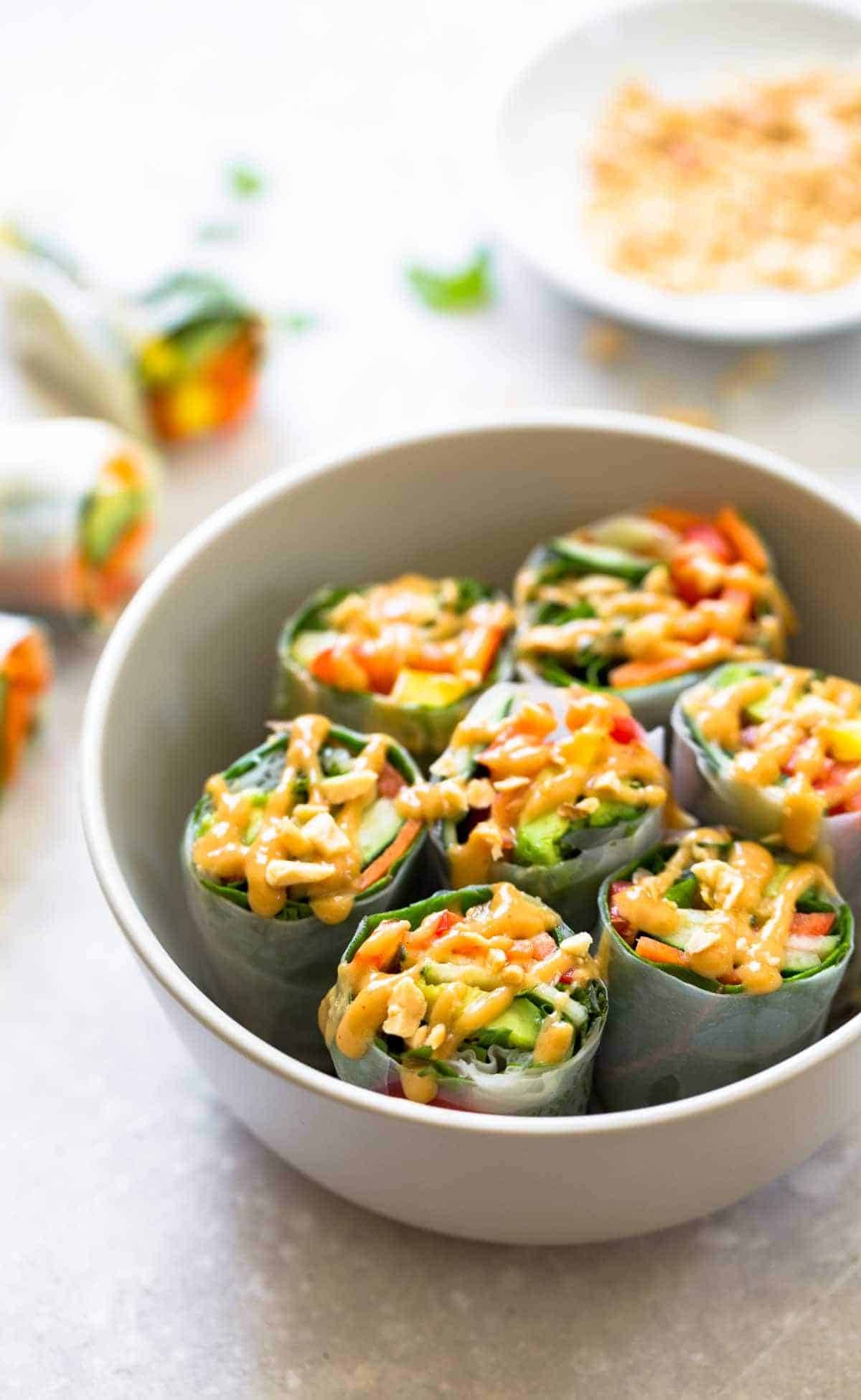 Thai Summer Rolls with Peanut Sauce in a bowl.