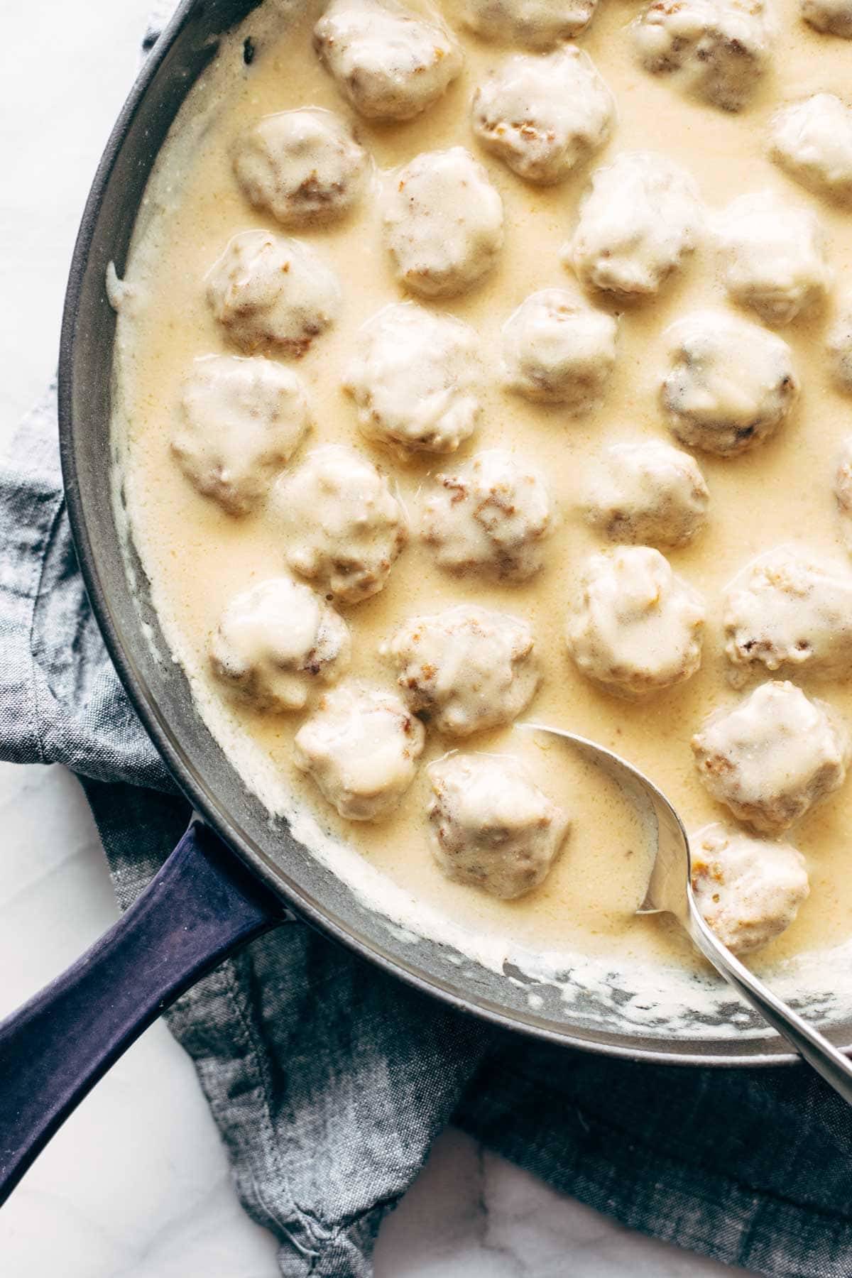 Swedish meatballs in a pan with gravy.