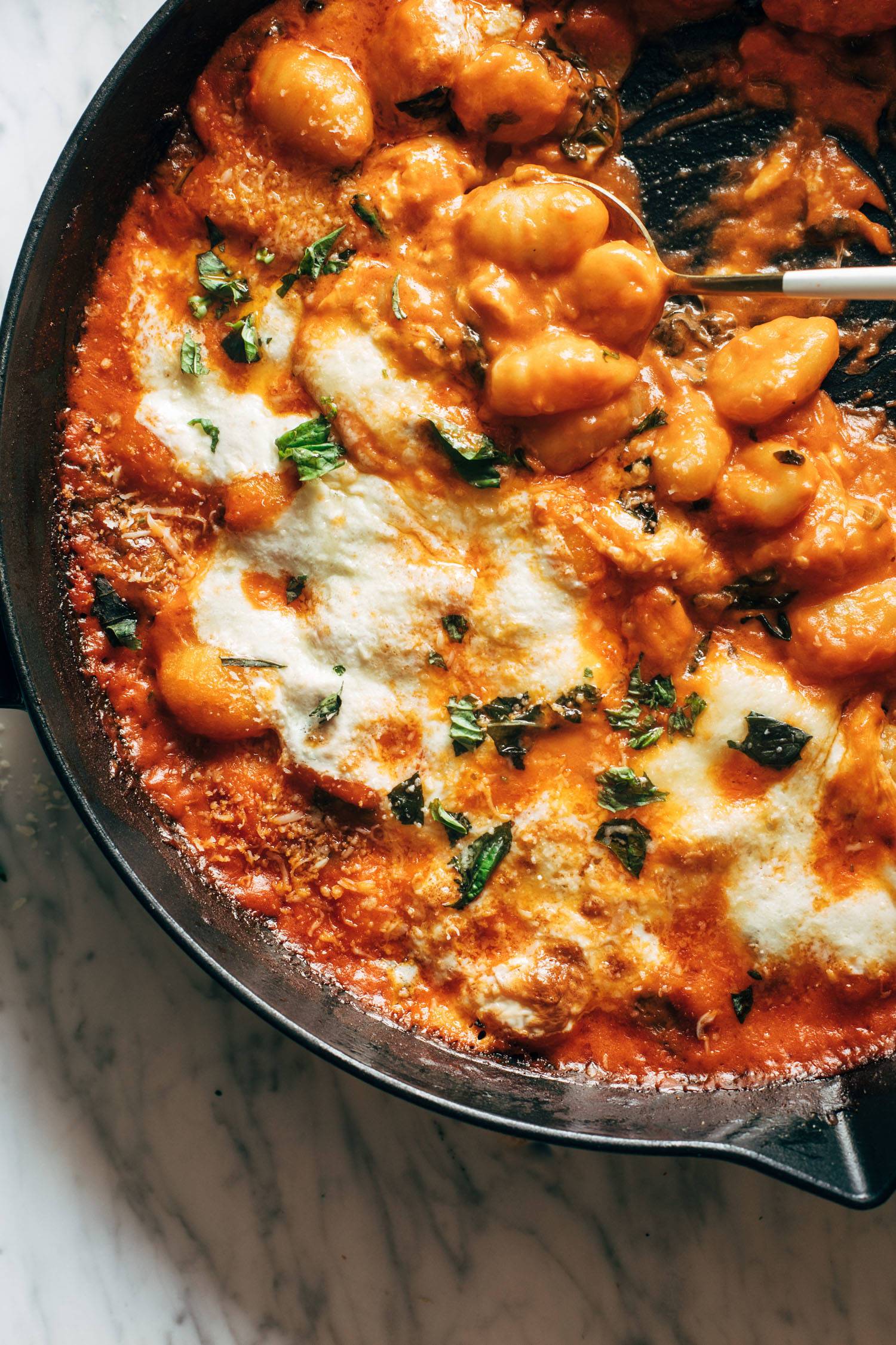 Cheesy gnocchi baked in a pan.