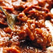 Tomato Butter Sauce in pan with spoon.