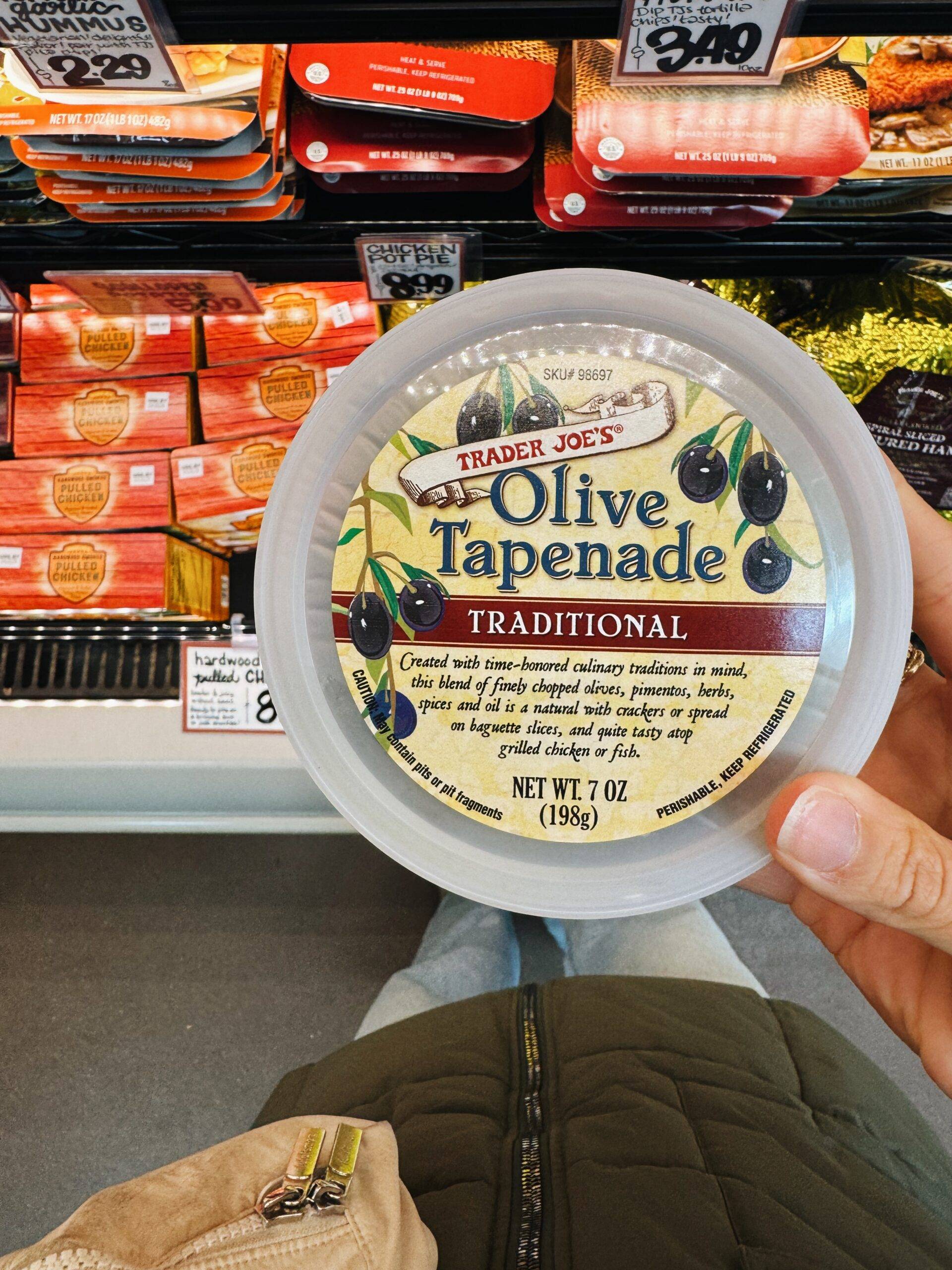 Container of traditional olive tapenade.