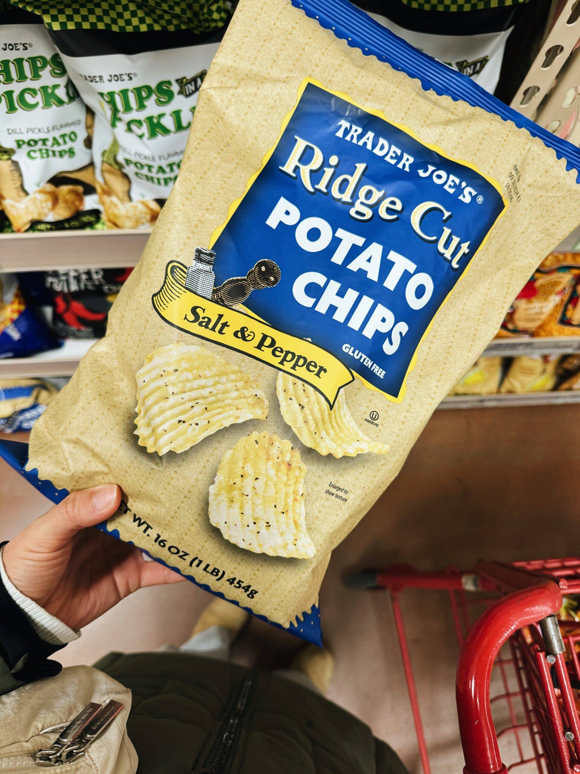 Salt and pepper ridge cut potato chips in a bag.
