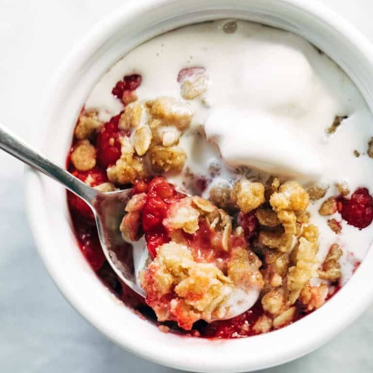 Raspberry Crumble in a bowl with a spoon.