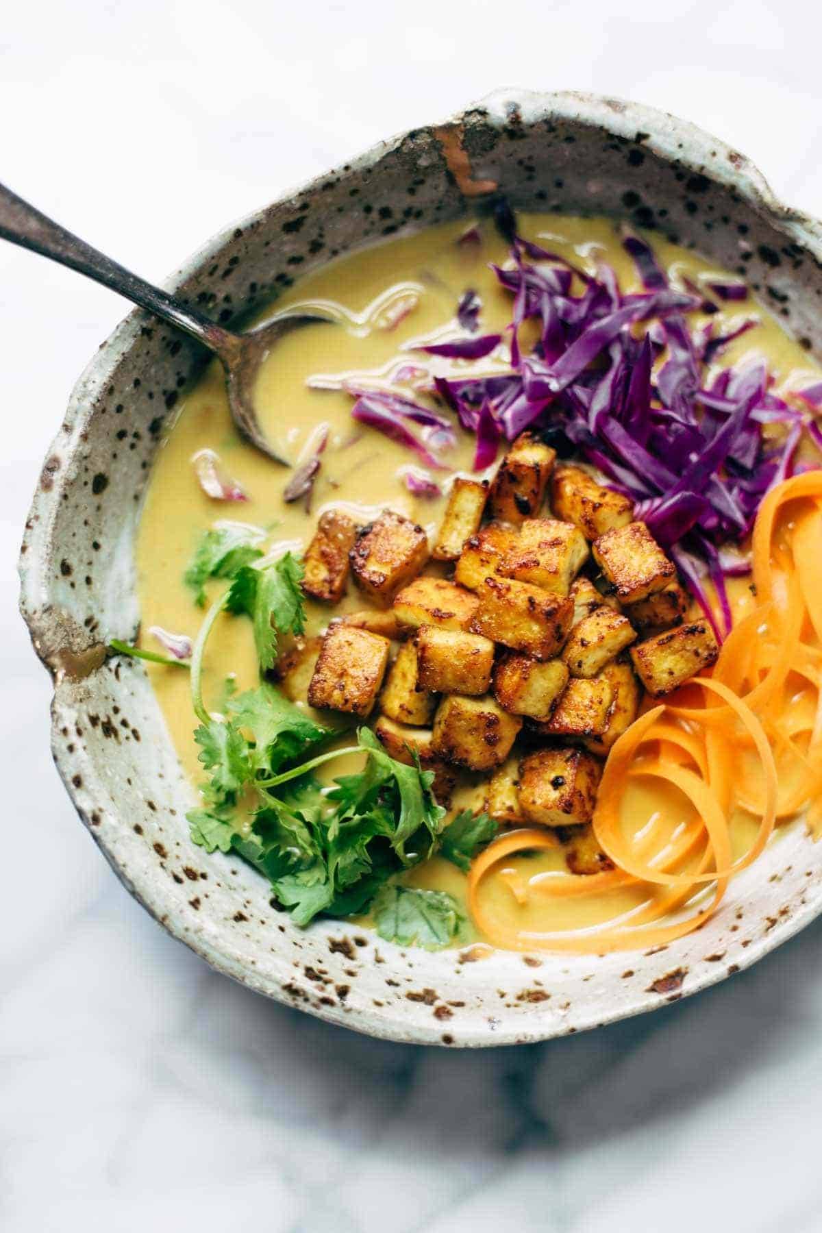 Coconut Curry Soup - this easy recipe can be made with almost ANY vegetables you have on hand! Silky-smooth and full of flavor. Vegetarian and vegan! | pinchofyum.com