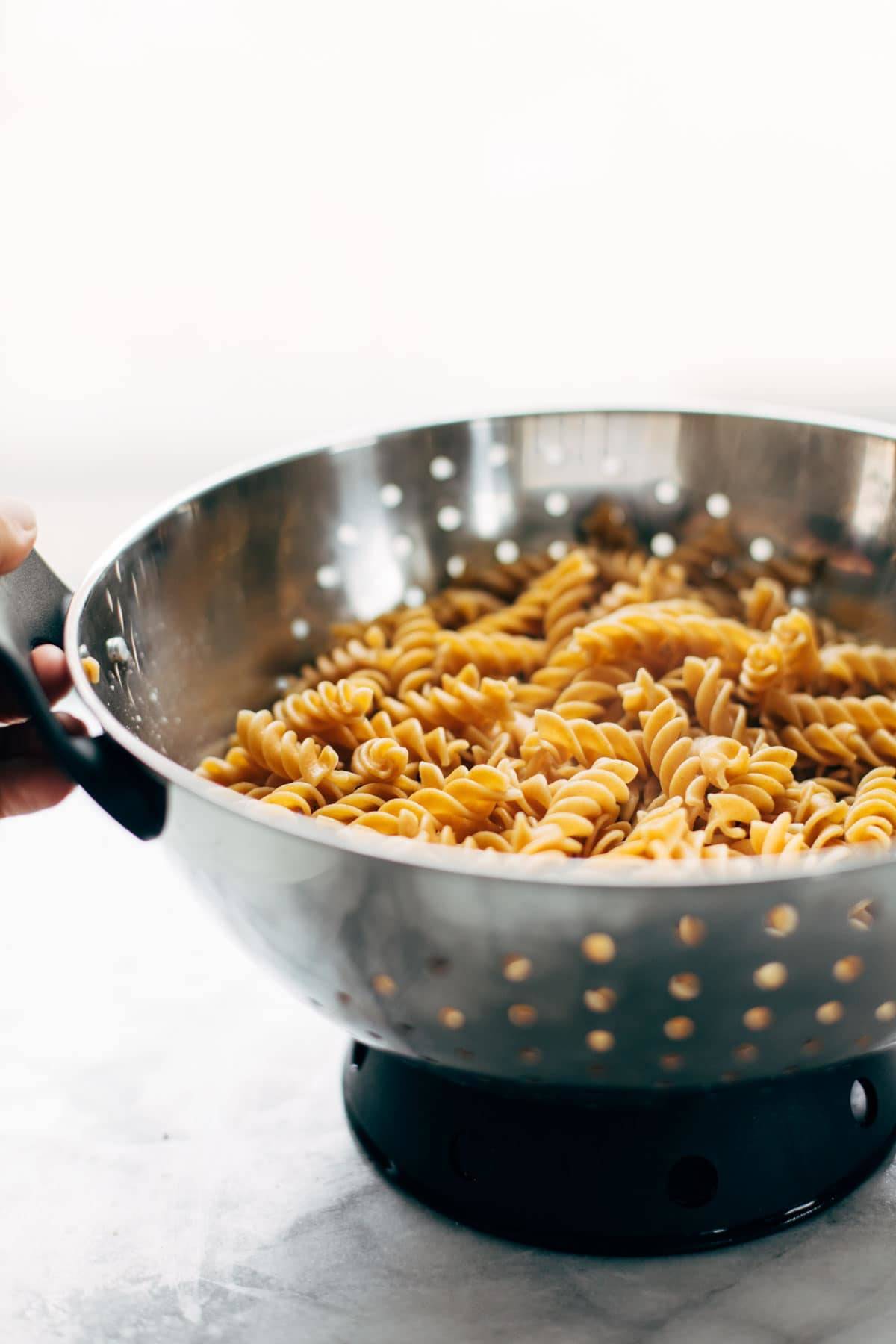 Pasta in a colander.