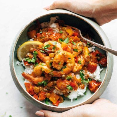 Spicy shrimp veracruz in a bowl with rice.