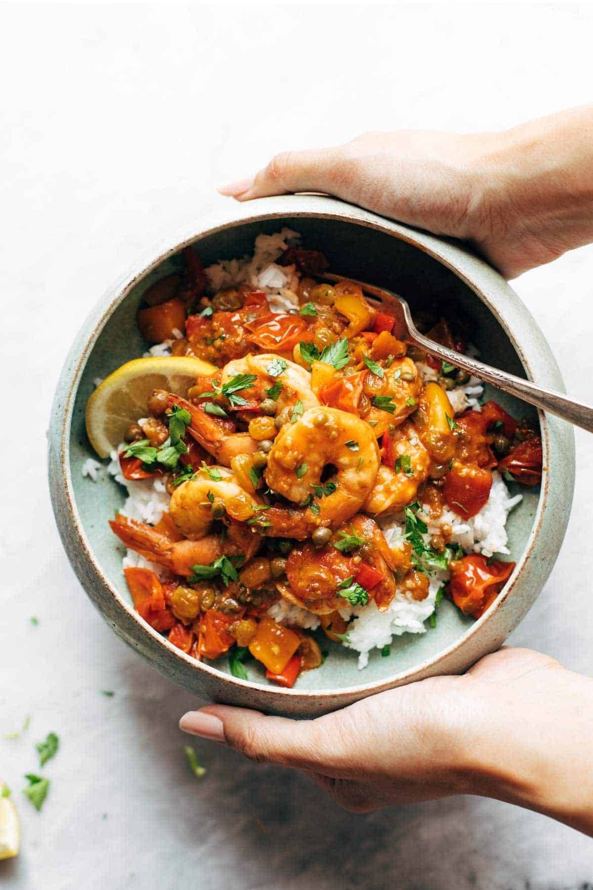 Spicy shrimp veracruz in a bowl with rice.