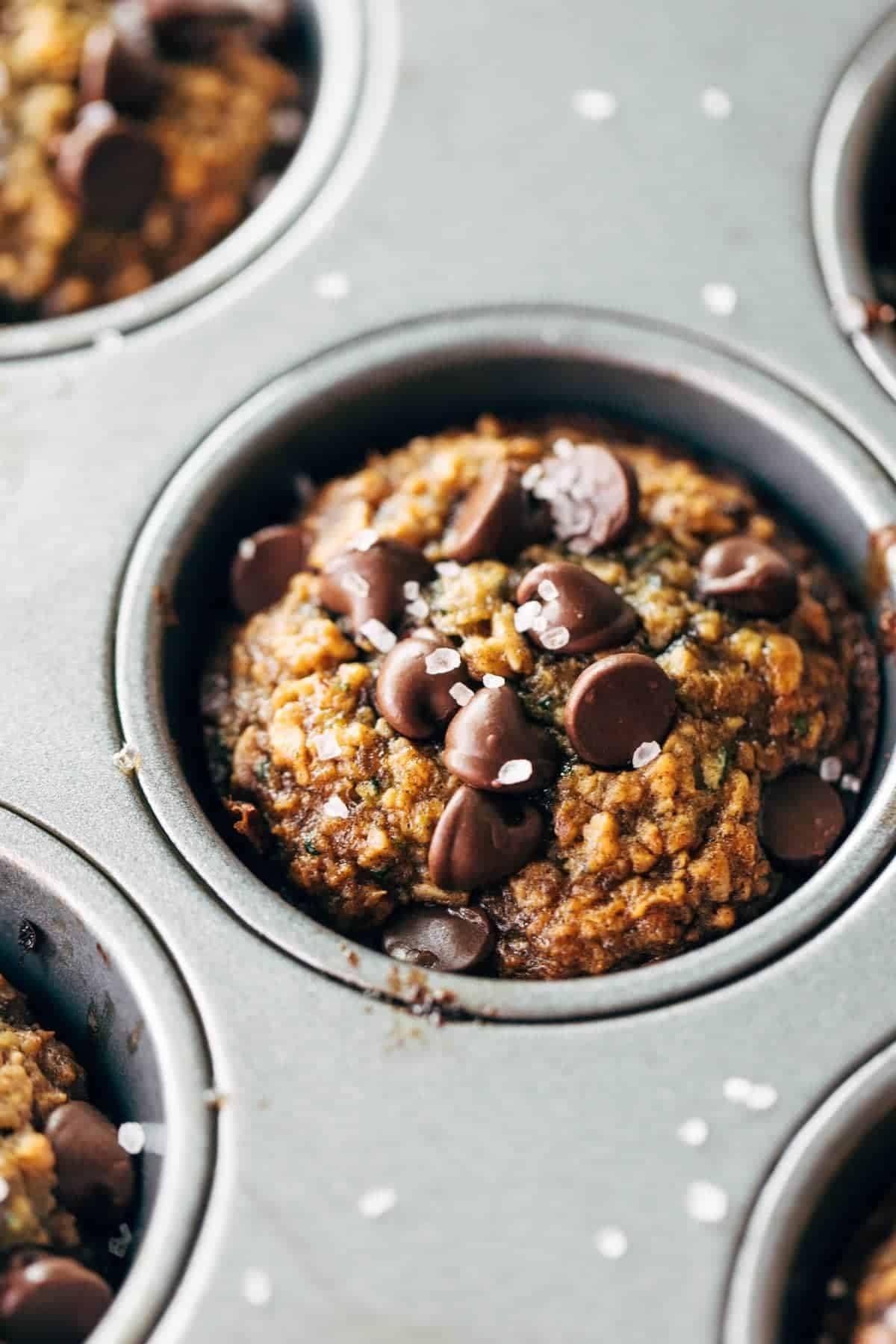 Zucchini muffins in a pan.