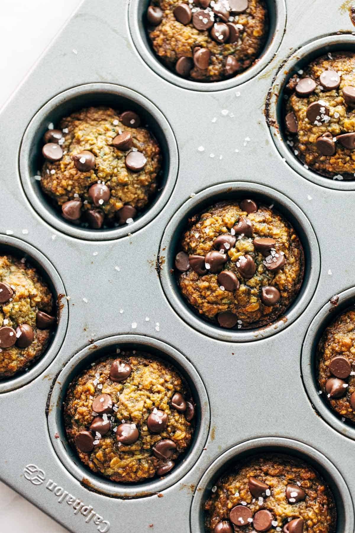 Zucchini muffins in a pan.