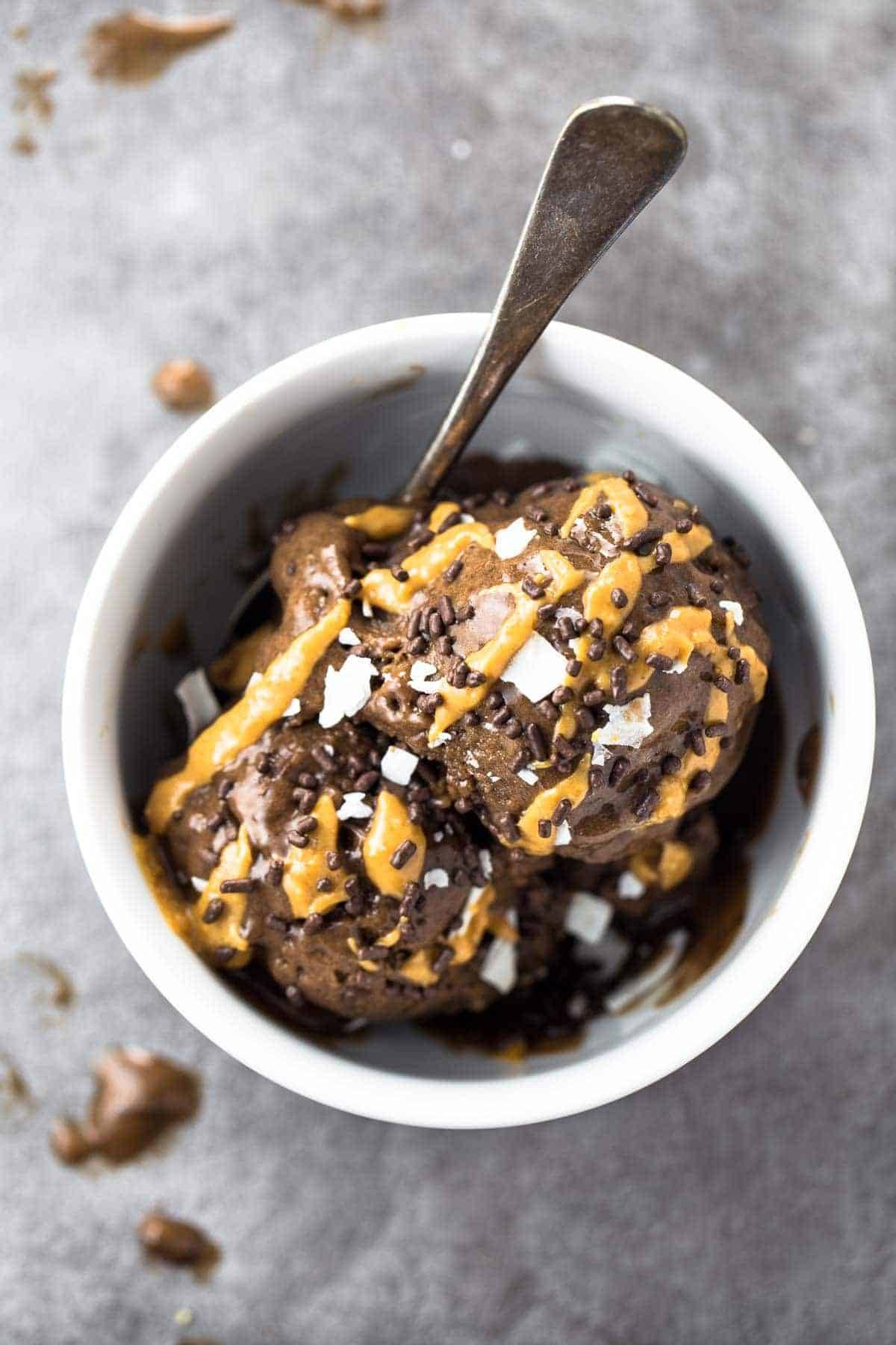 This naturally sweet ice cream is made with ALOHA superfood chocolate and bananas! You won't believe it's only 3 ingredients and 5 minutes to make! | pinchofyum.com
