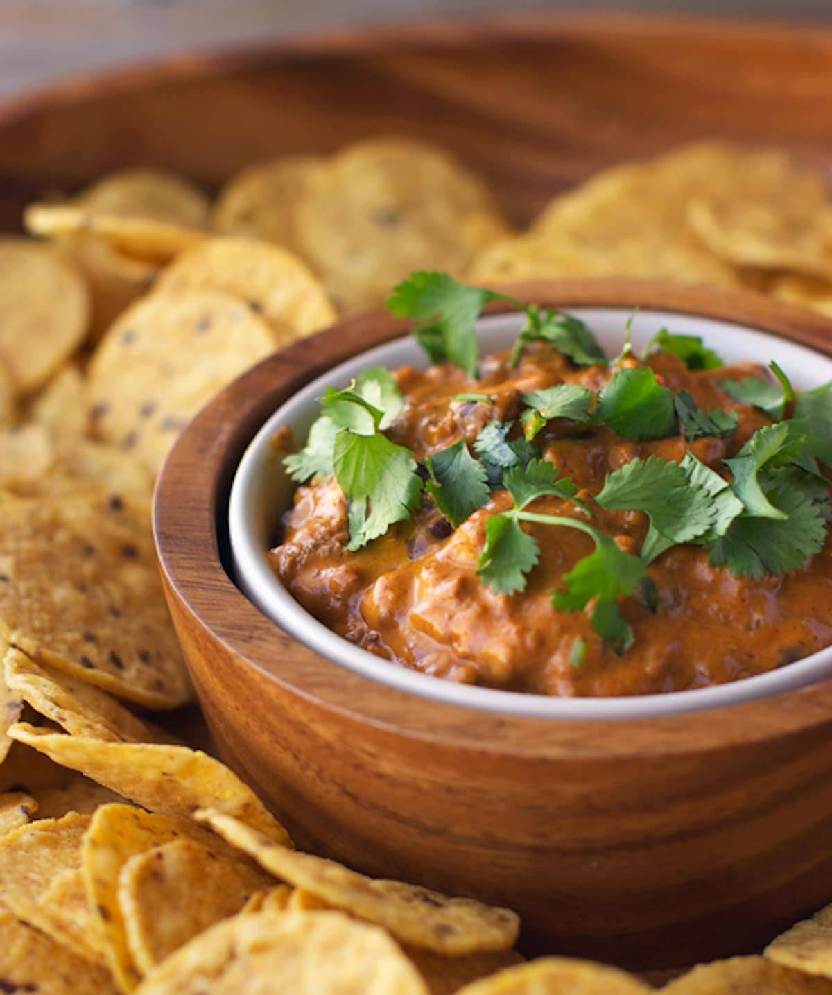 Chili cheese black bean dip served with tortilla chips. 