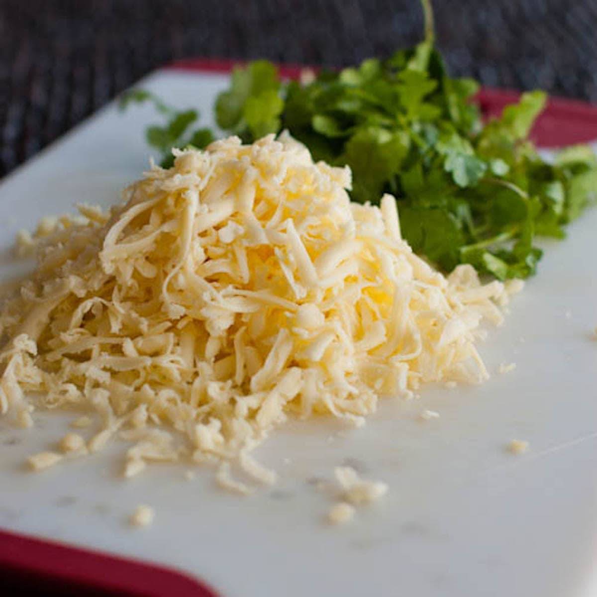 Chicken tamale pie ingredients on a cutting board.