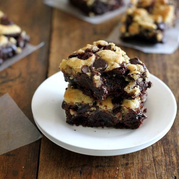 Cookie brownies stacked on a plate.