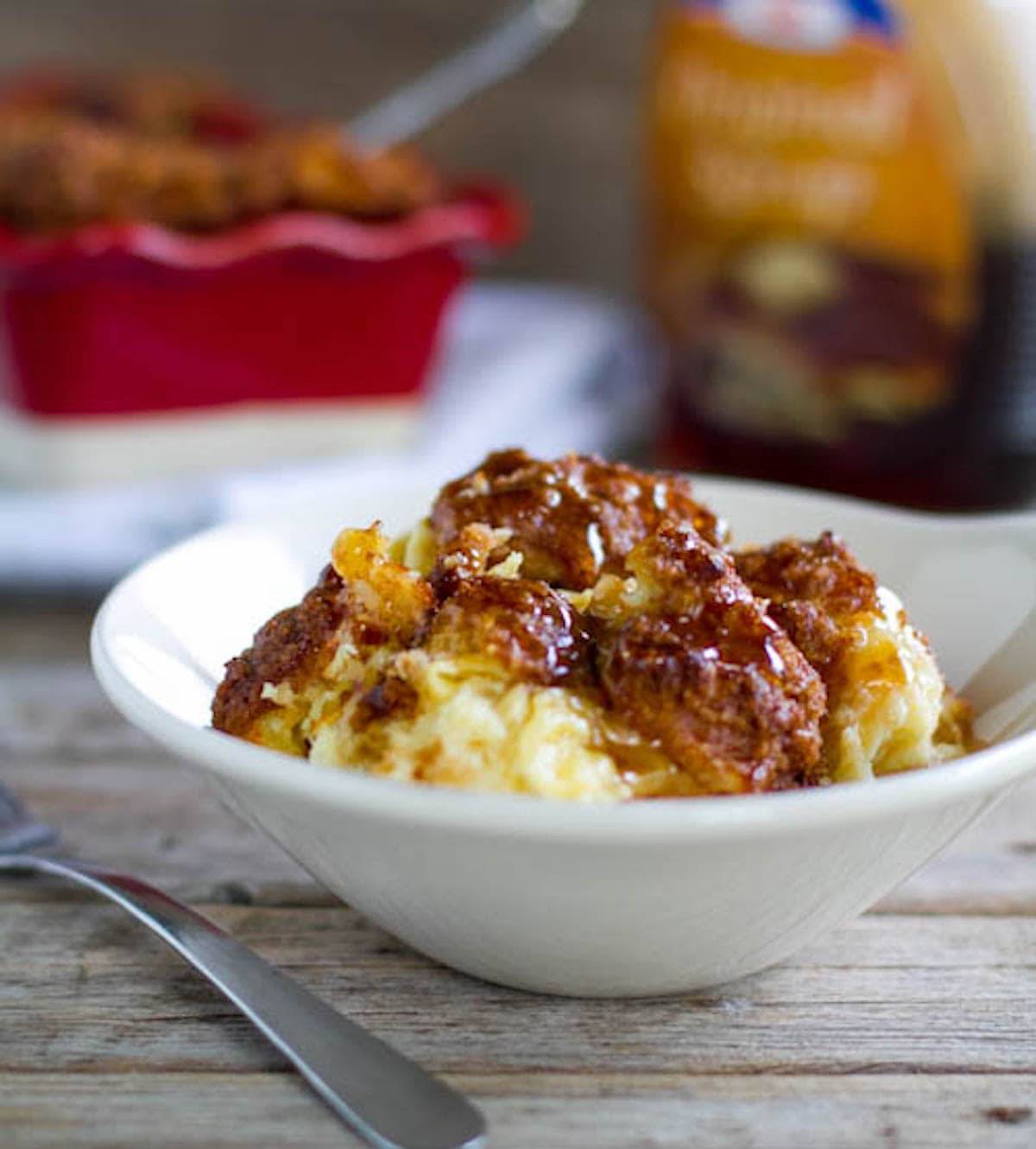 Cinnamon croissant French toast in a bowl.