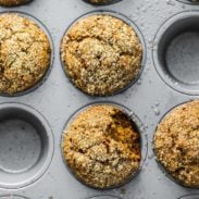 Healthy gingerbread muffins in a muffin tin.