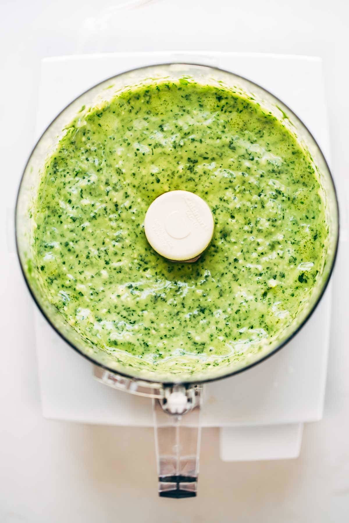 5 Minute Magic Green Sauce - SO AWESOME. Made with easy ingredients like avocado, olive oil, cilantro, lime, garlic, and parsley! Vegan. | pinchofyum.com