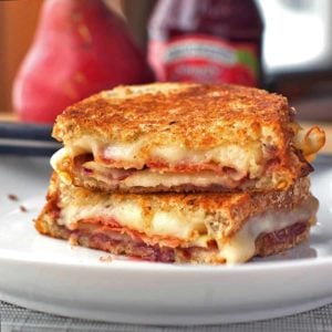 Bacon, Pear, and Raspberry Grilled Cheese Recipe - Pinch of Yum