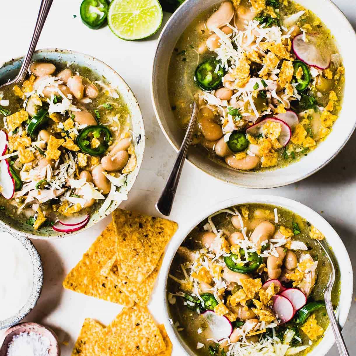 Jalapeño lime chicken soup in bowls.