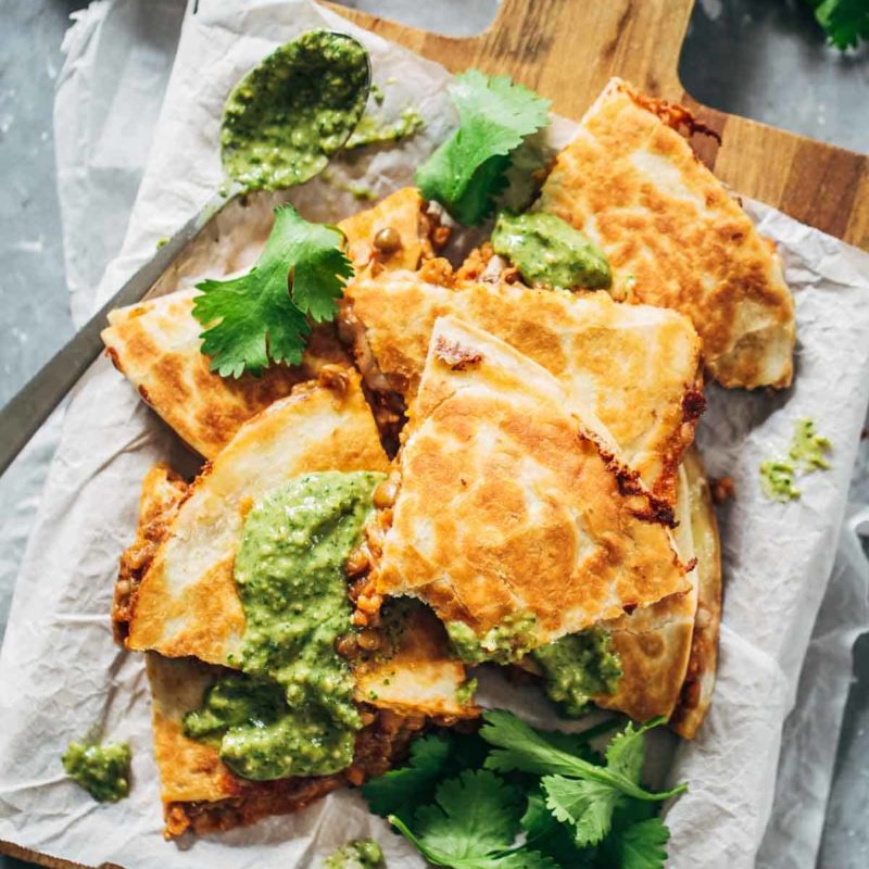Super Easy Lentil Quesadillas Recipe - melted Pepperjack cheese + a spicy lentil and brown rice filling. Easy, made from scratch, crockpot friendly, vegetarian comfort food! | pinchofyum.com