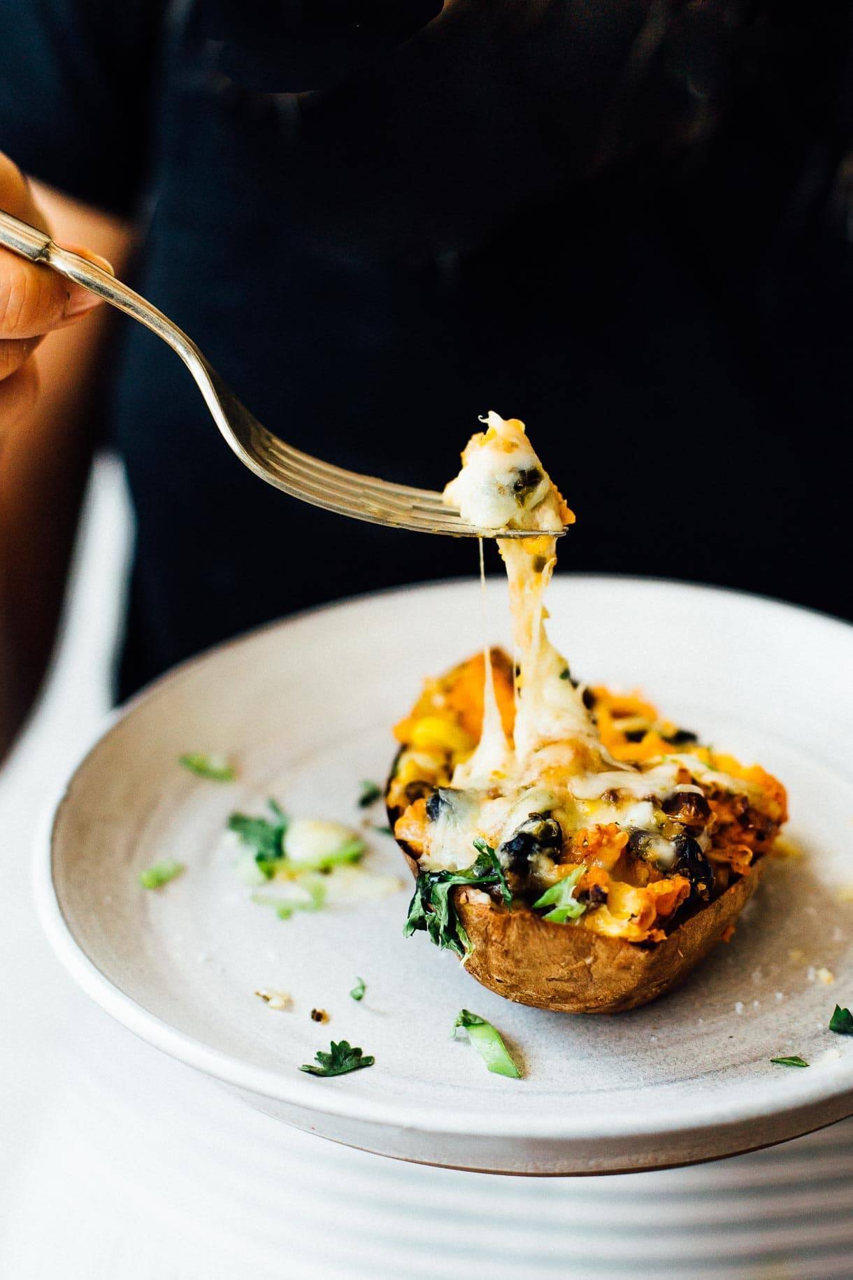 Taking a bite from sweet potato skins.
