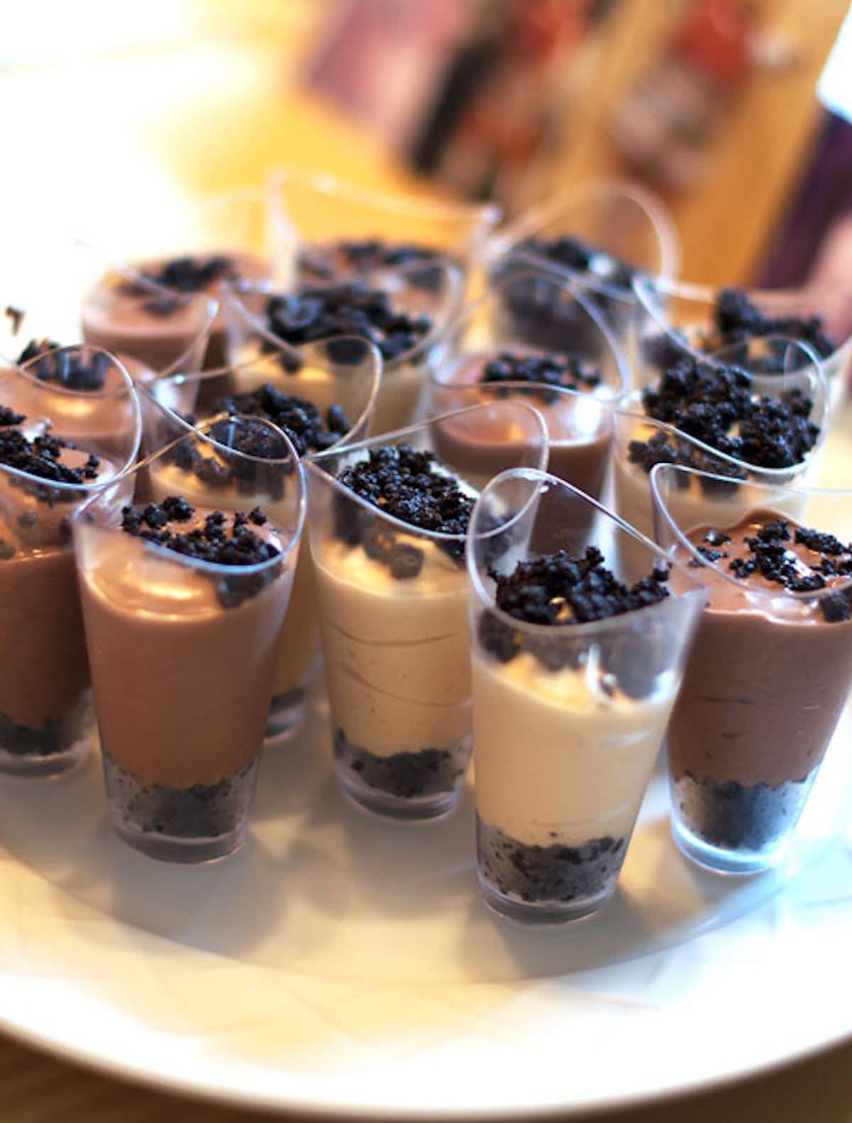 Peanut butter pie shooters in small glasses.