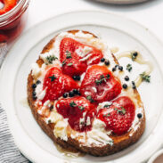 Pickled strawberries on toasts