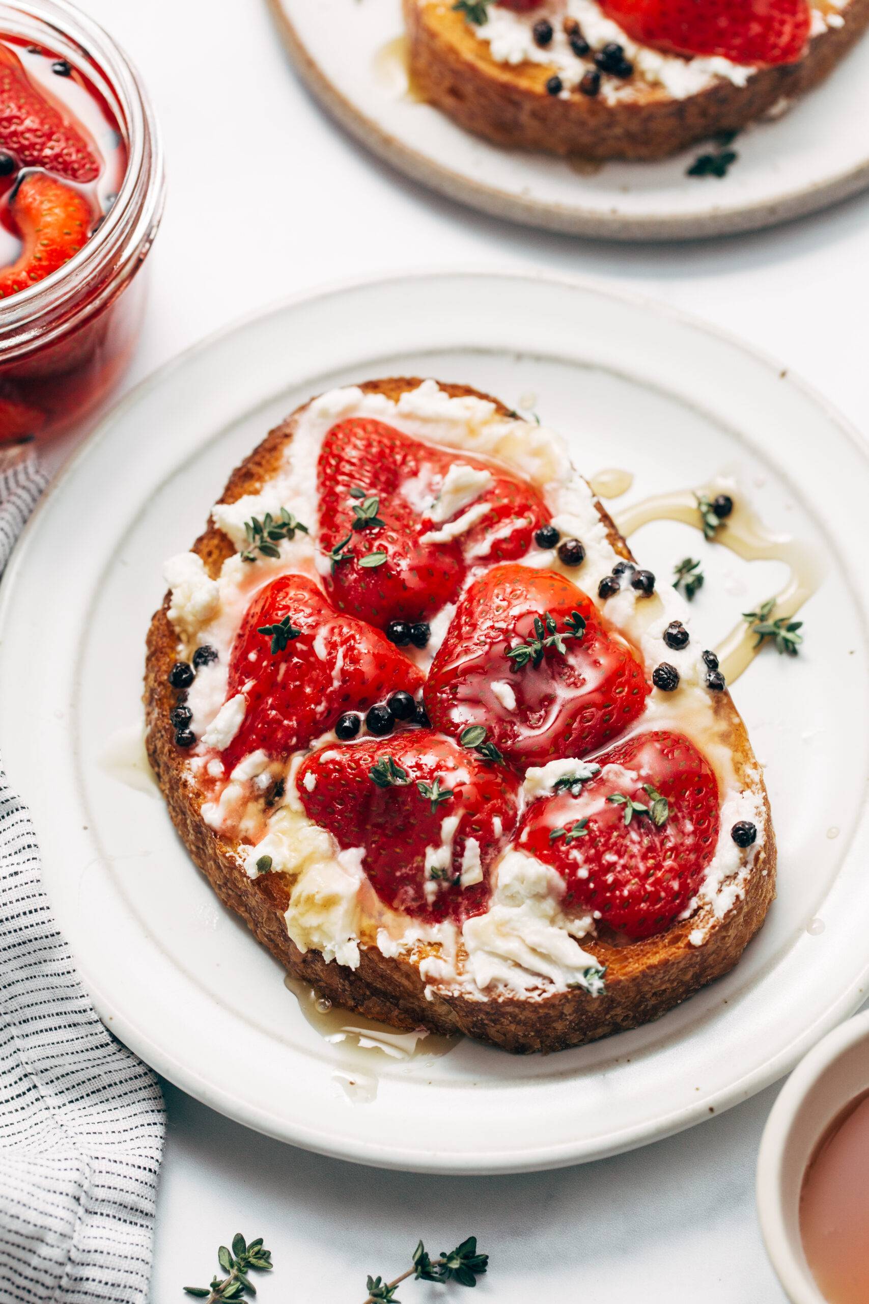 Pickled strawberries on toasts