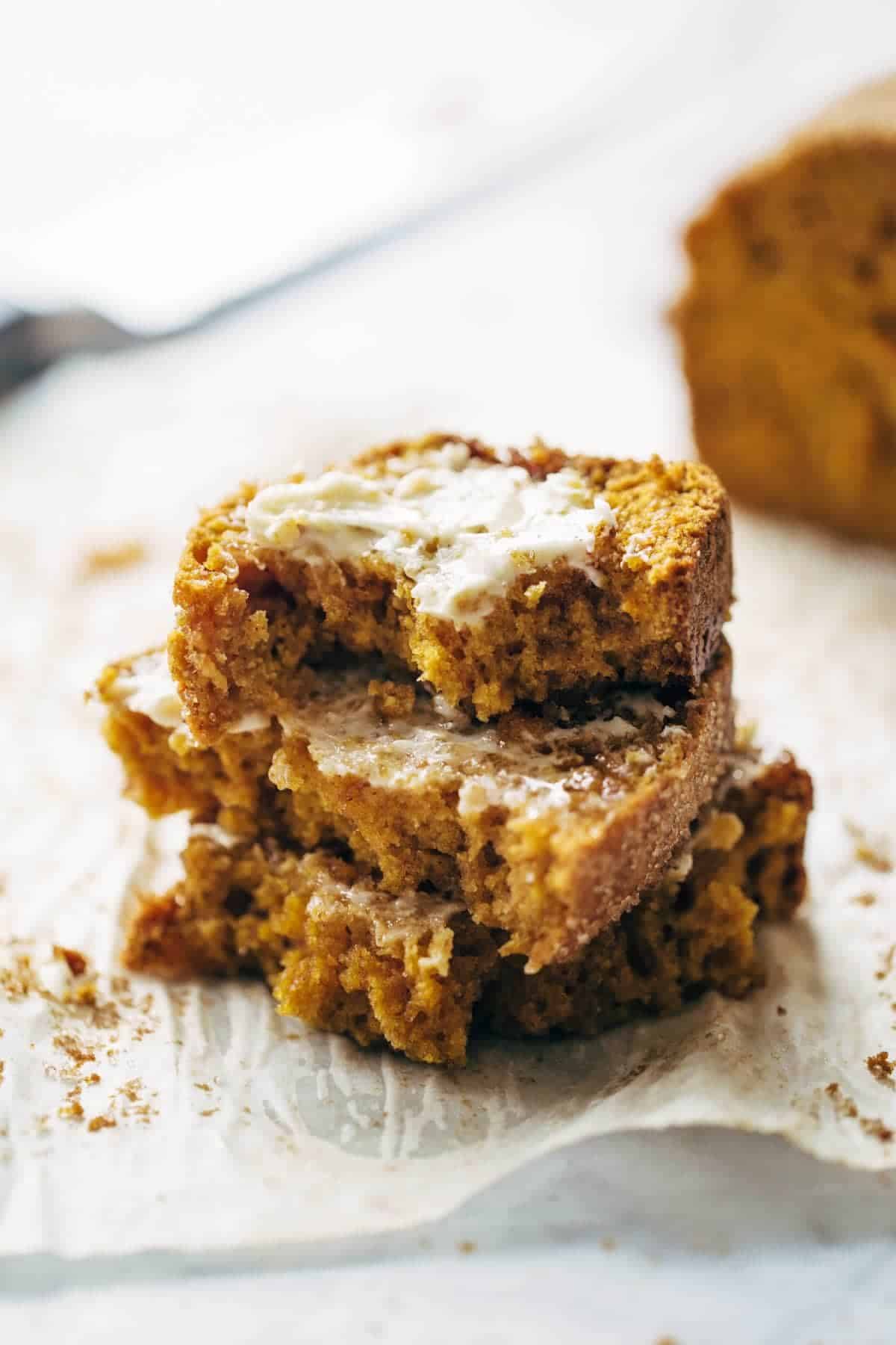 Pumpkin bread with butter stacked.