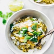 Roasted Tomatillo Chicken and Rice Bowls with a fork.